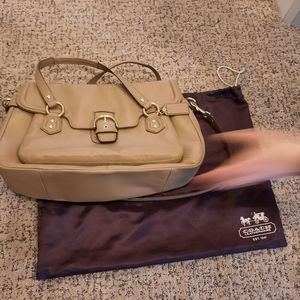 Never used Coach F26127 satchel in saddle or camel colored pebbled leather.